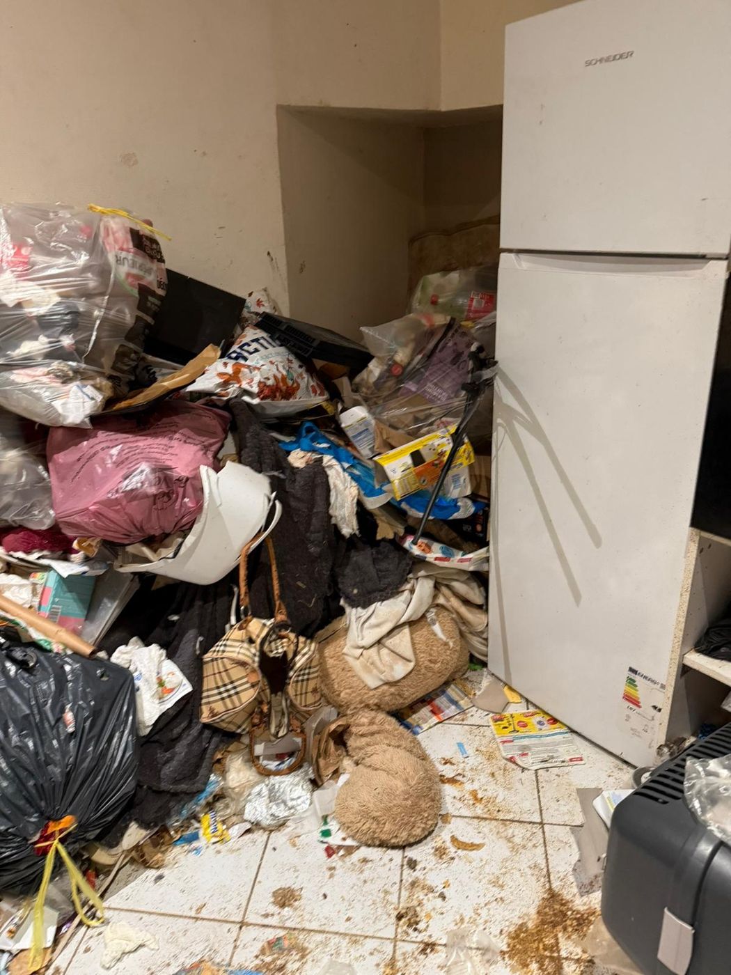 Appartement encombré avant débarras à Nancy
